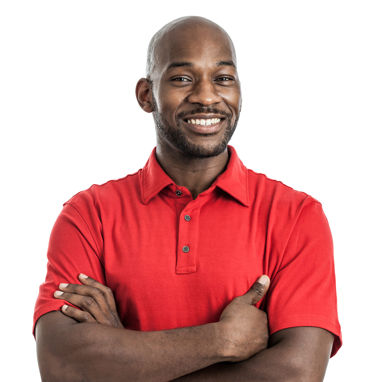 Professional man smiling in red collared shirt with arms crossed, confident business person, friendly expression, corporate headshot, team leader, positive attitude, modern business portrait, diverse professional, executive image, workplace photography, PICS | Inventory Specialists.